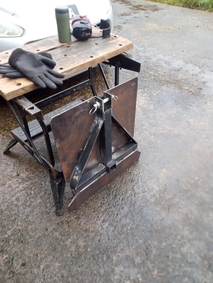 Welding a heavy  backing plate to a simple three point linkage mounting frame.