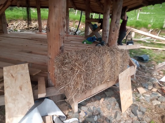 The same straw bale seen from outside the house.