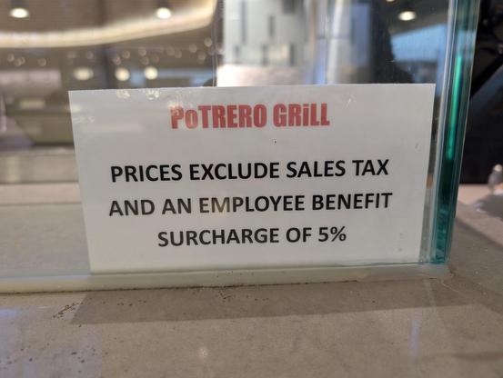 Sign staying the alongside sales taxes +and tips) an "employee benefit" charge of 5% is somehow not included in the price. 