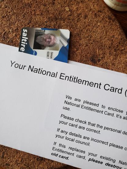 Part of my national identity card, with part of the letter it came with.